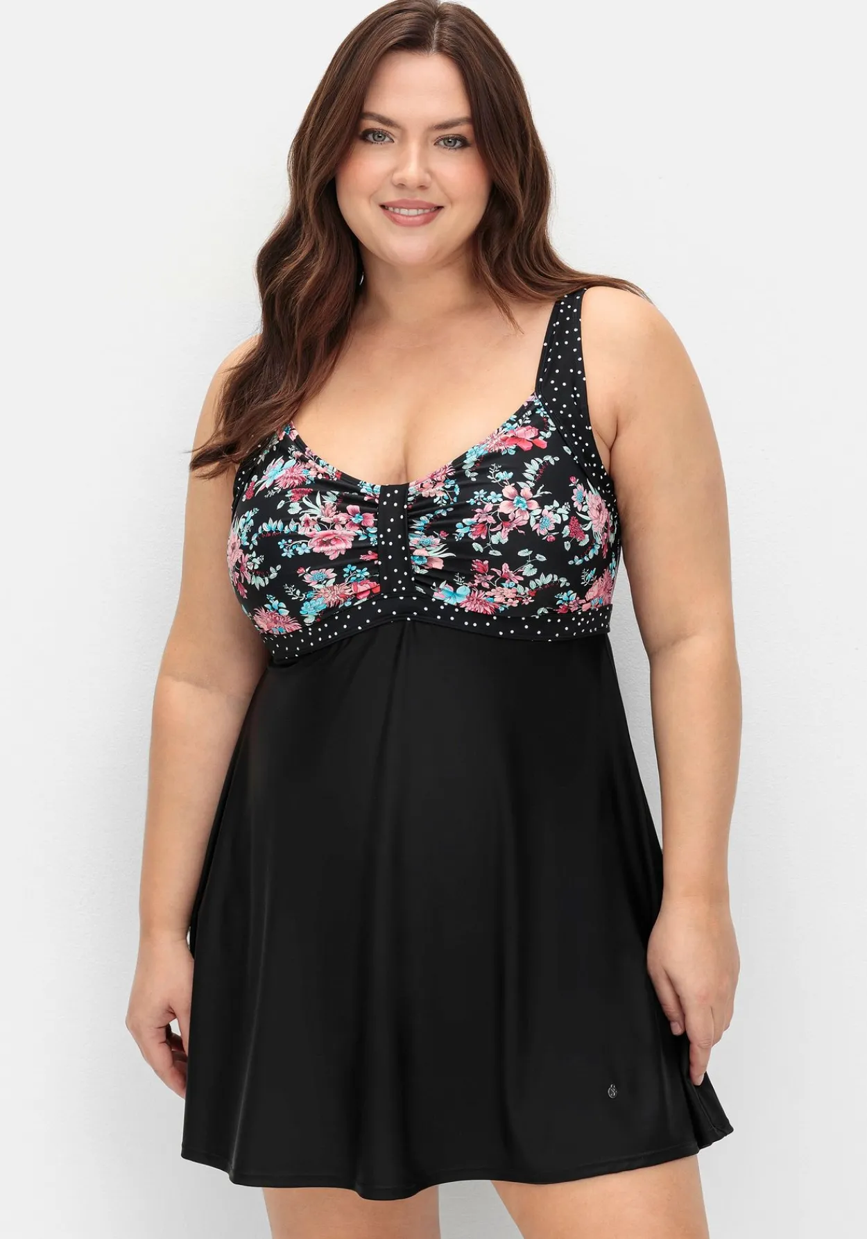 Badekleid im Mustermix mit integrierter Hose<sheego New