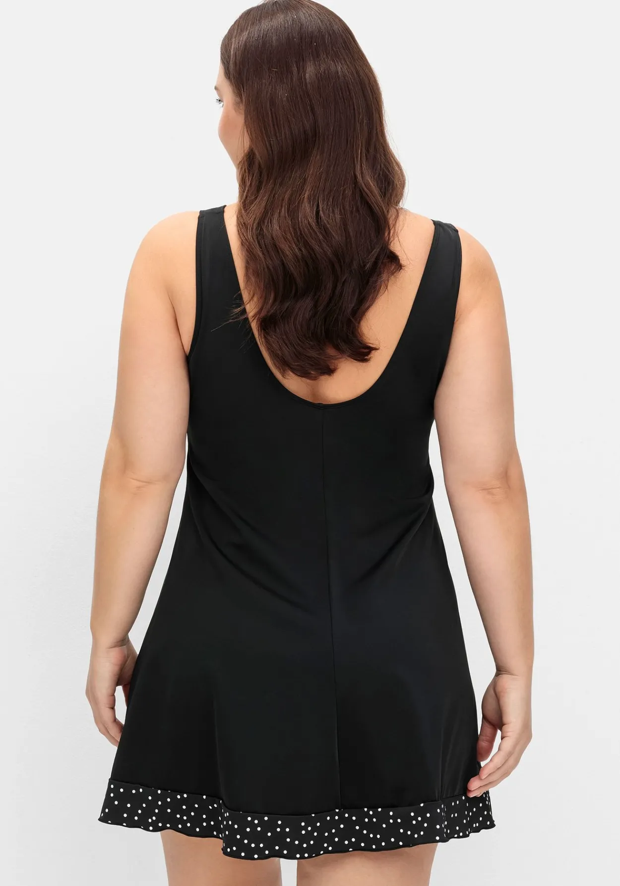 Badekleid mit Pünktchen und integrierter Hose<sheego Fashion