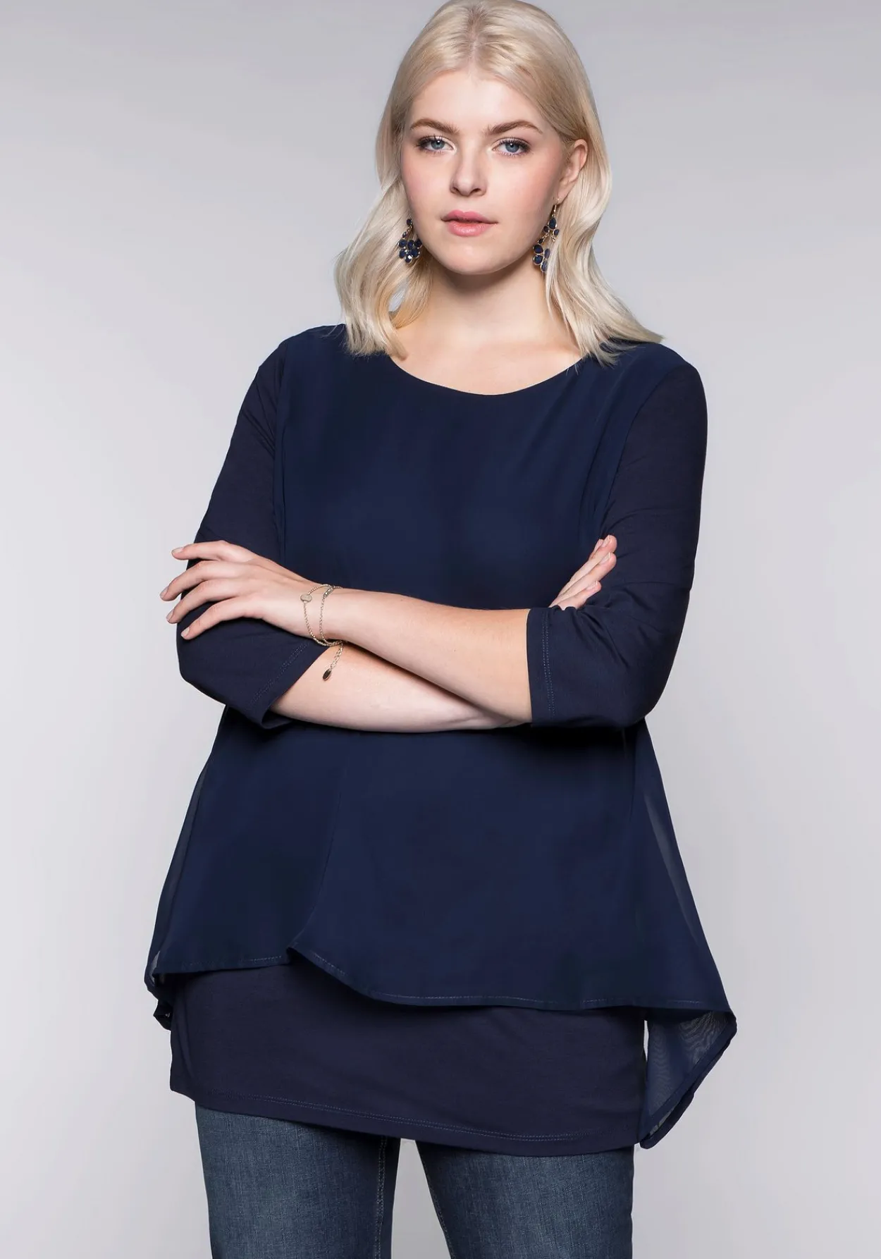 Blusenshirt in leichter A-Linie mit Zipfelsaum<sheego Discount