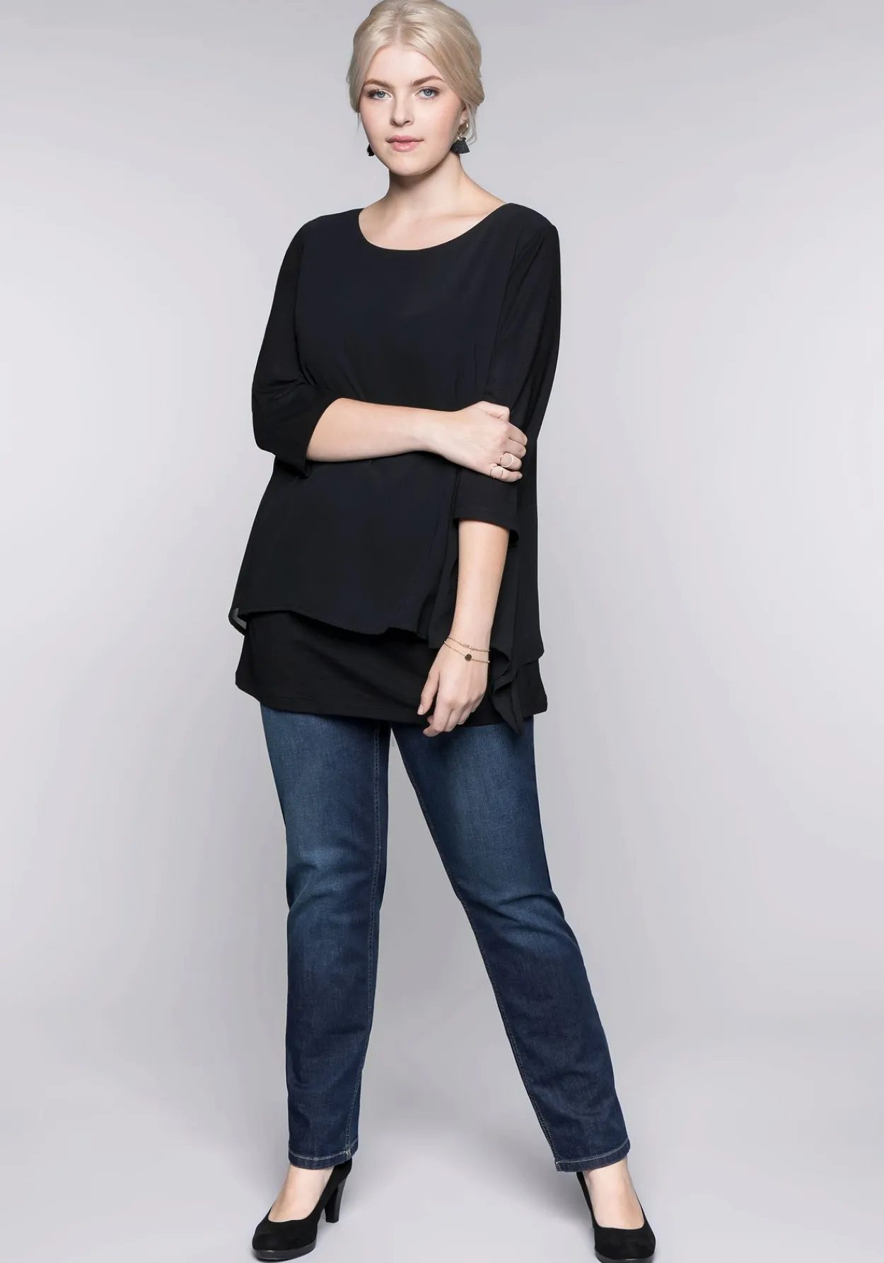 Blusenshirt in leichter A-Linie mit Zipfelsaum<sheego Fashion