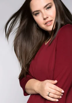 Blusenshirt in leichter A-Linie mit Zipfelsaum<sheego Fashion