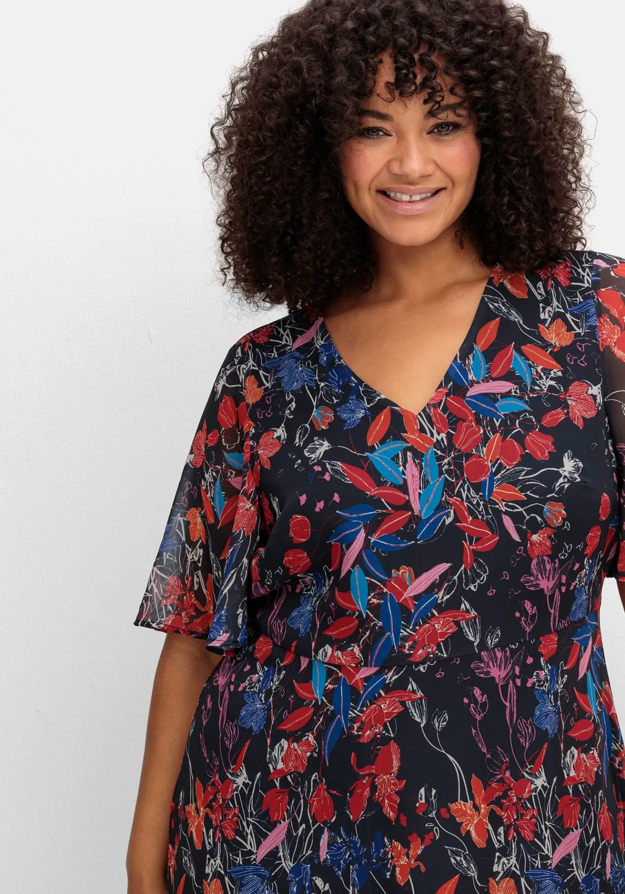 Chiffonkleid mit Blumendruck und Volant am Saum<sheego Sale