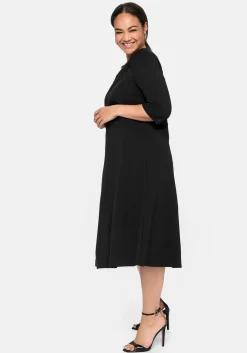 Cocktailkleid mit U-Boot-Ausschnitt und Spitzeneinsatz<sheego Fashion