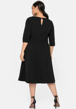Cocktailkleid mit U-Boot-Ausschnitt und Spitzeneinsatz<sheego Fashion