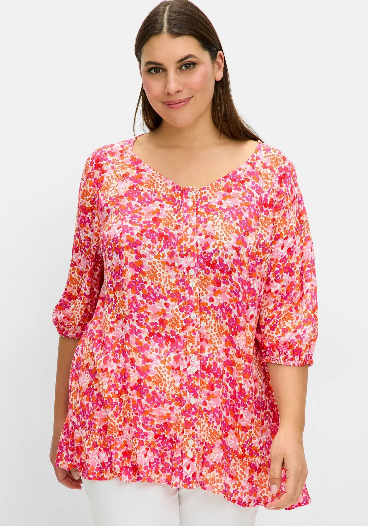 Crêpe-Bluse mit Blumendruck und Volant am Saum<sheego Fashion