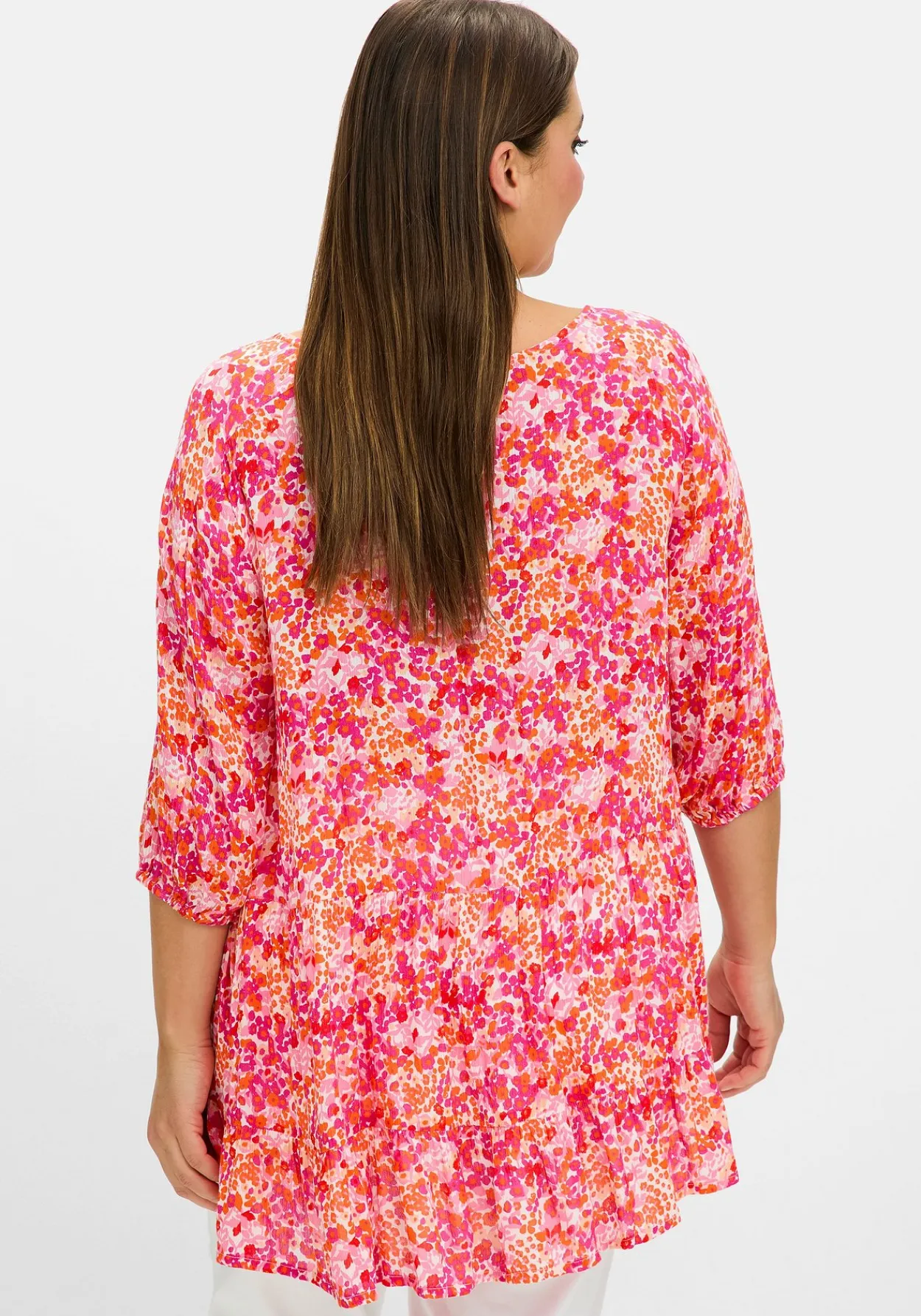 Crêpe-Bluse mit Blumendruck und Volant am Saum<sheego Fashion
