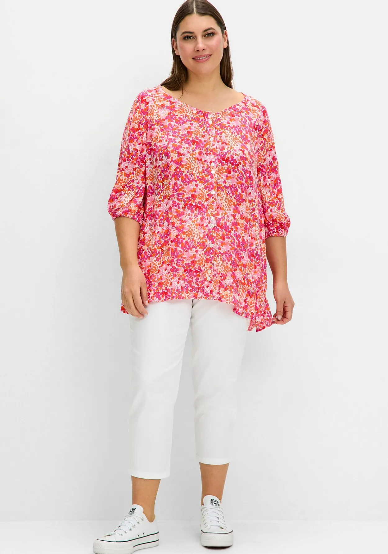 Crêpe-Bluse mit Blumendruck und Volant am Saum<sheego Fashion