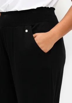 Jerseyhose mit breitem Smokbund und Blumendruck<sheego Discount