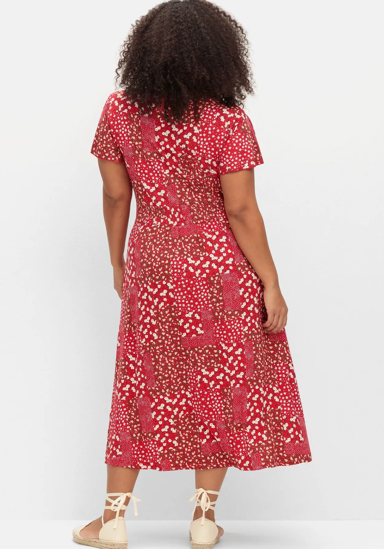 Jerseykleid in Midilänge, mit Blumenprint<sheego Hot