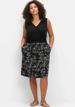 Jerseykleid in Wickeloptik, mit V-Cut hinten<sheego Hot