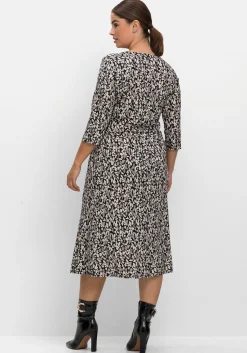 Jerseykleid in Wickeloptik, mit Blätterprint<sheego Clearance