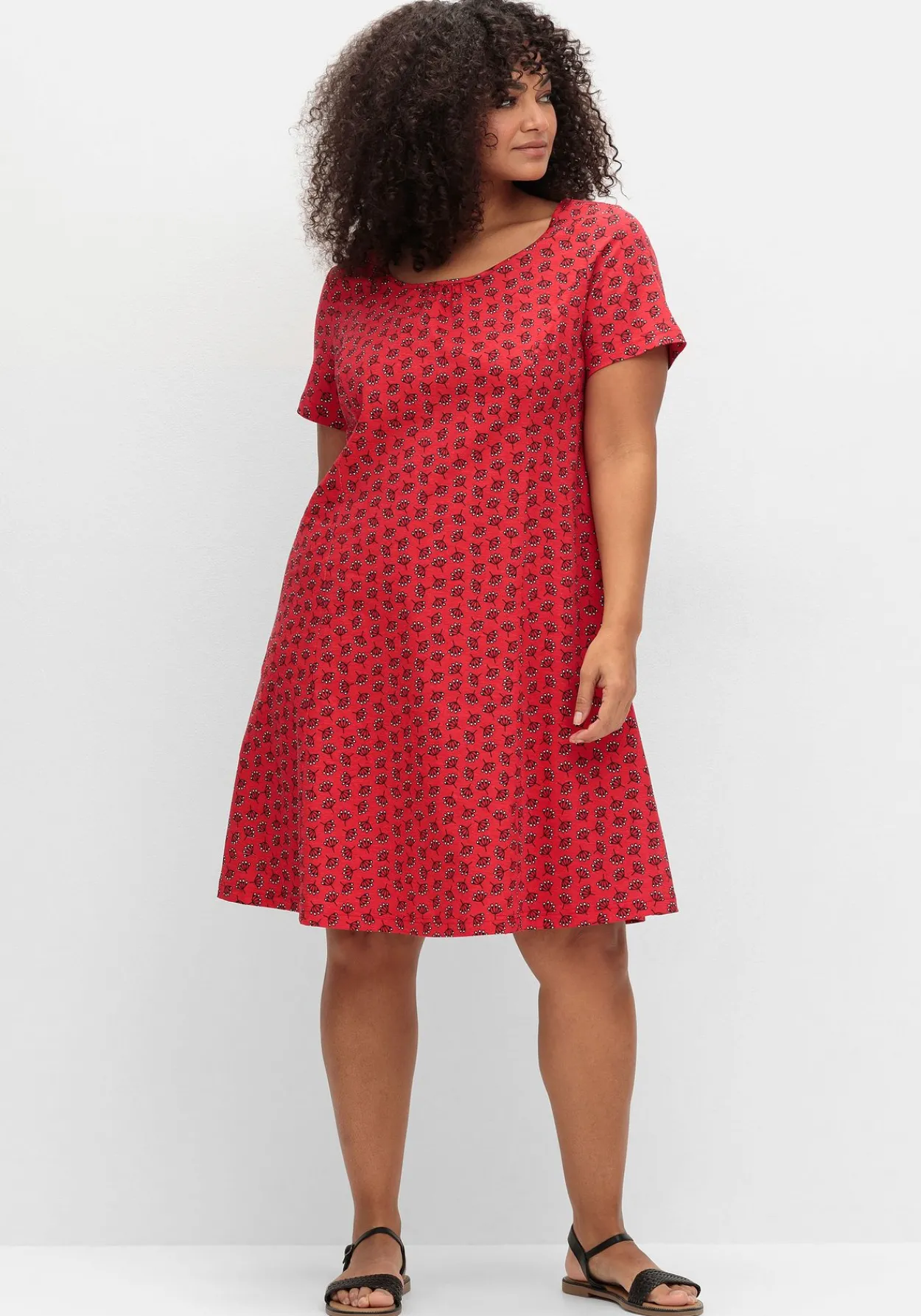 Jerseykleid mit schwingendem Rockteil<sheego New