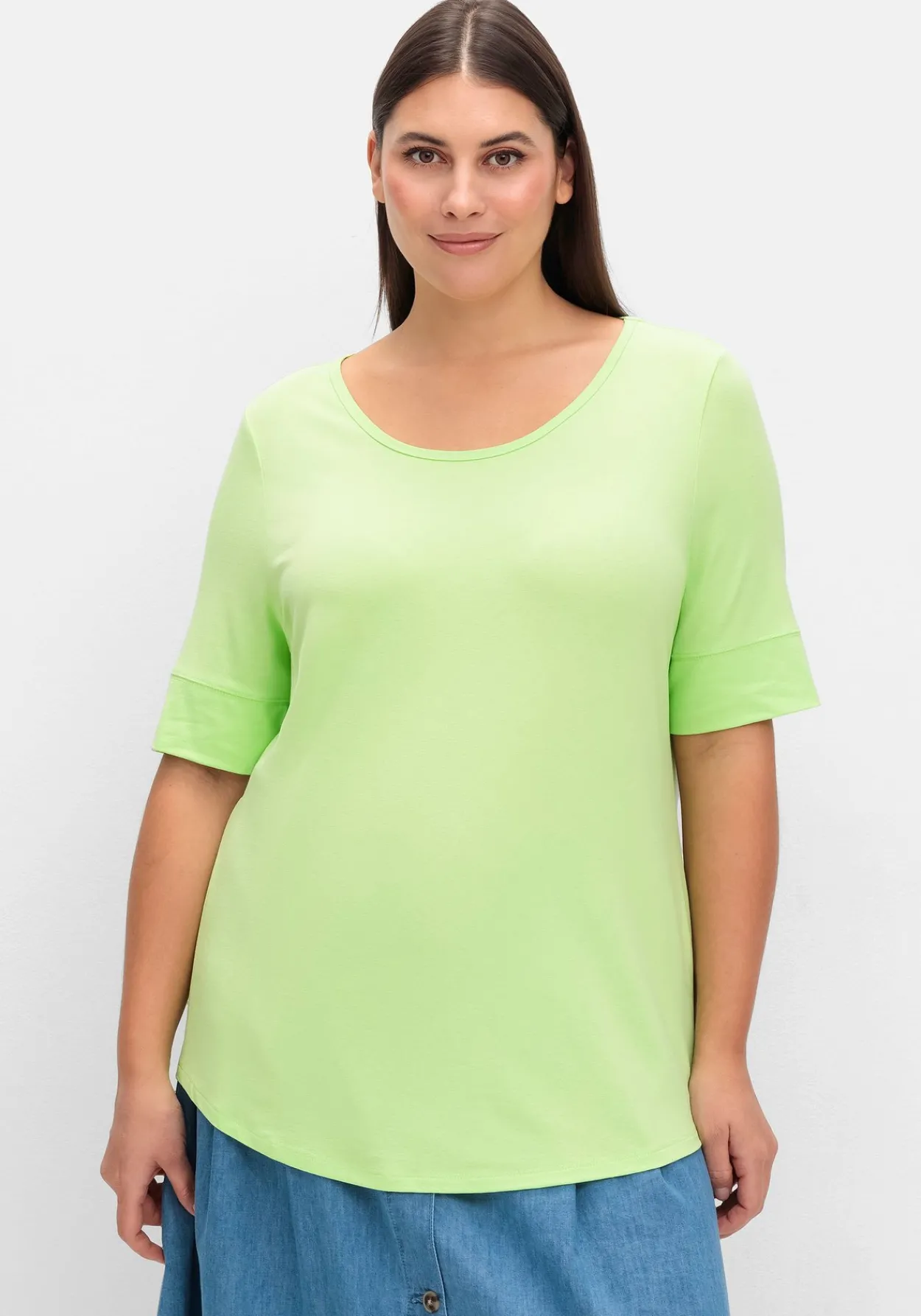 Jerseyshirt mit abgerundetem Saum<sheego Fashion