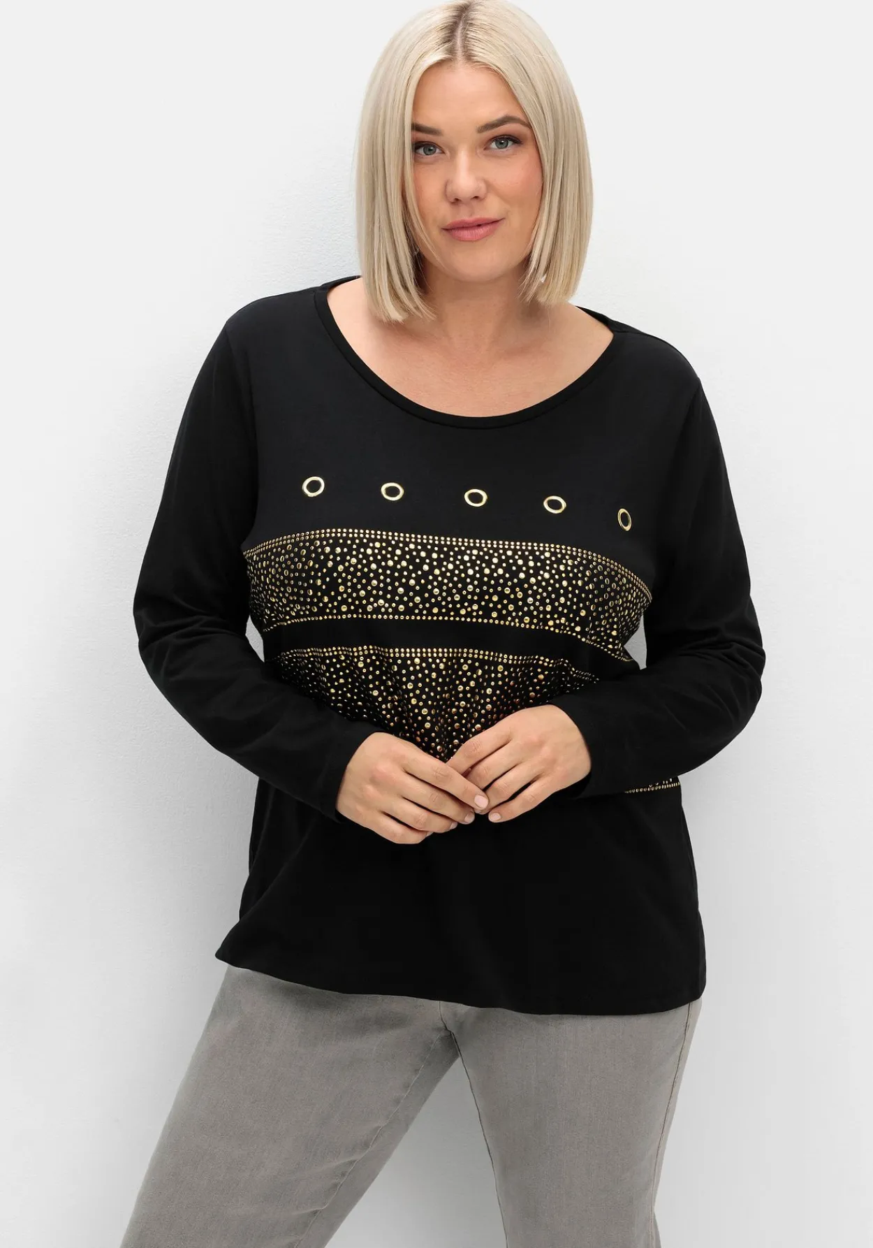 Langarmshirt mit Ösen- und Nietenverzierung<sheego Online
