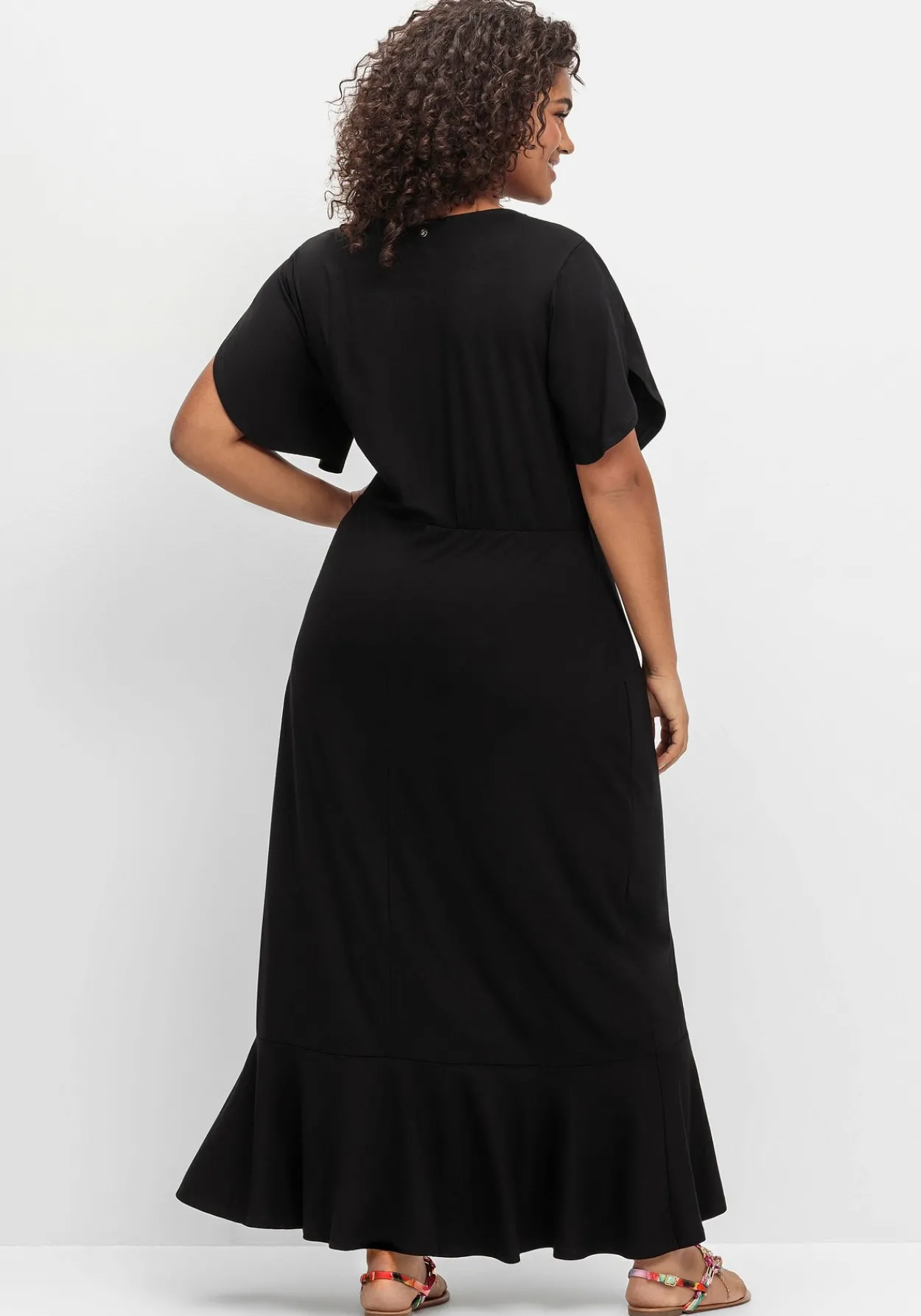 Langes Jerseykleid in Wickeloptik, mit Volantrock<sheego Sale