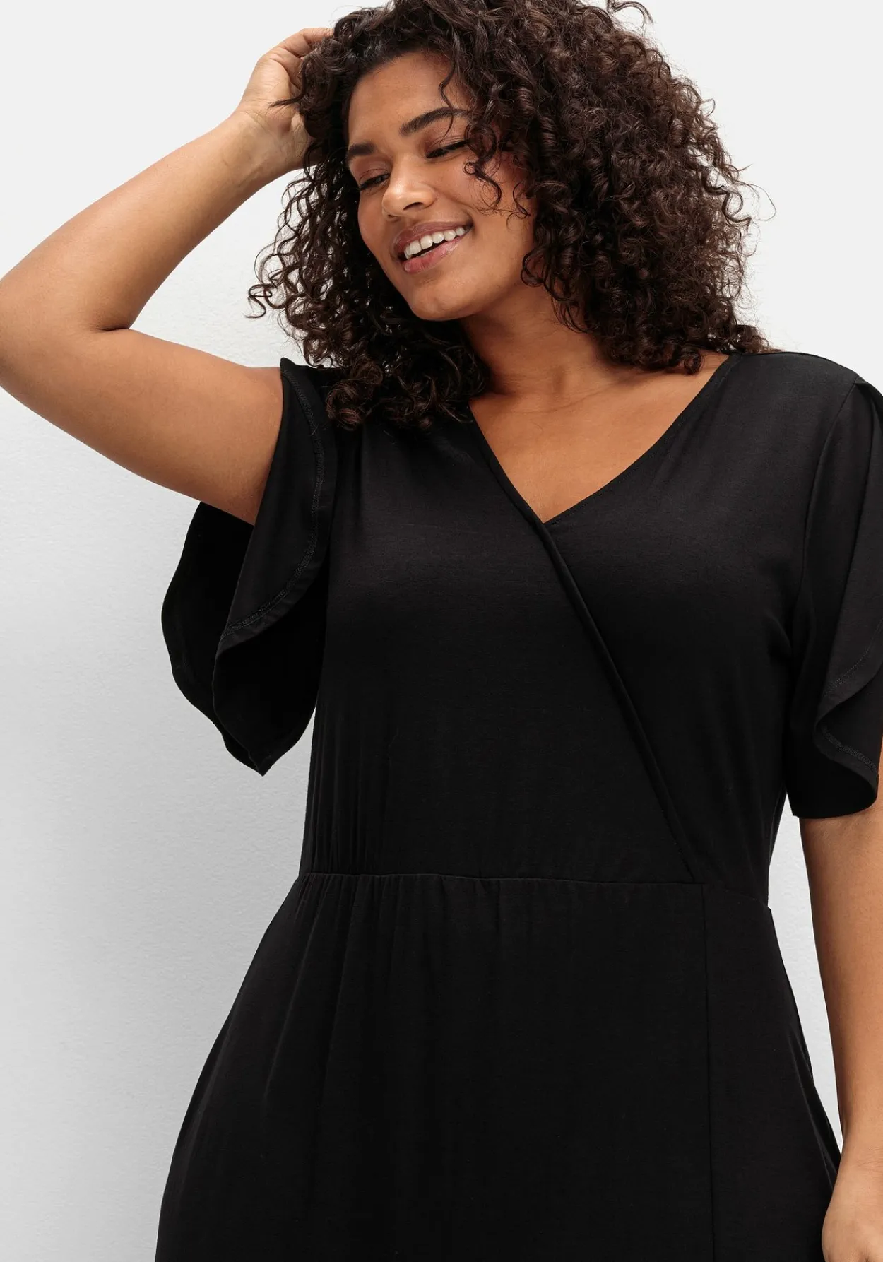 Langes Jerseykleid in Wickeloptik, mit Volantrock<sheego Sale