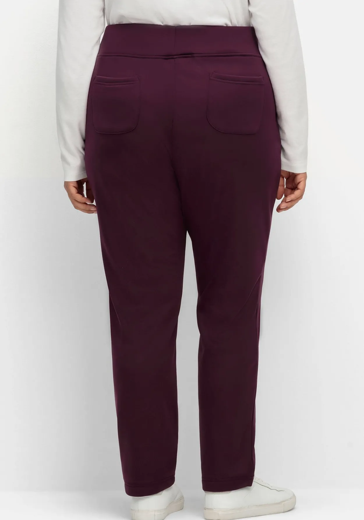 Leicht glänzende Schlupfhose mit Fleece-Innenseite<sheego Outlet