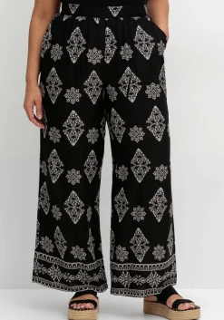 Schlupfhose mit Allover- und Bordürendruck<sheego by Joe Browns Sale