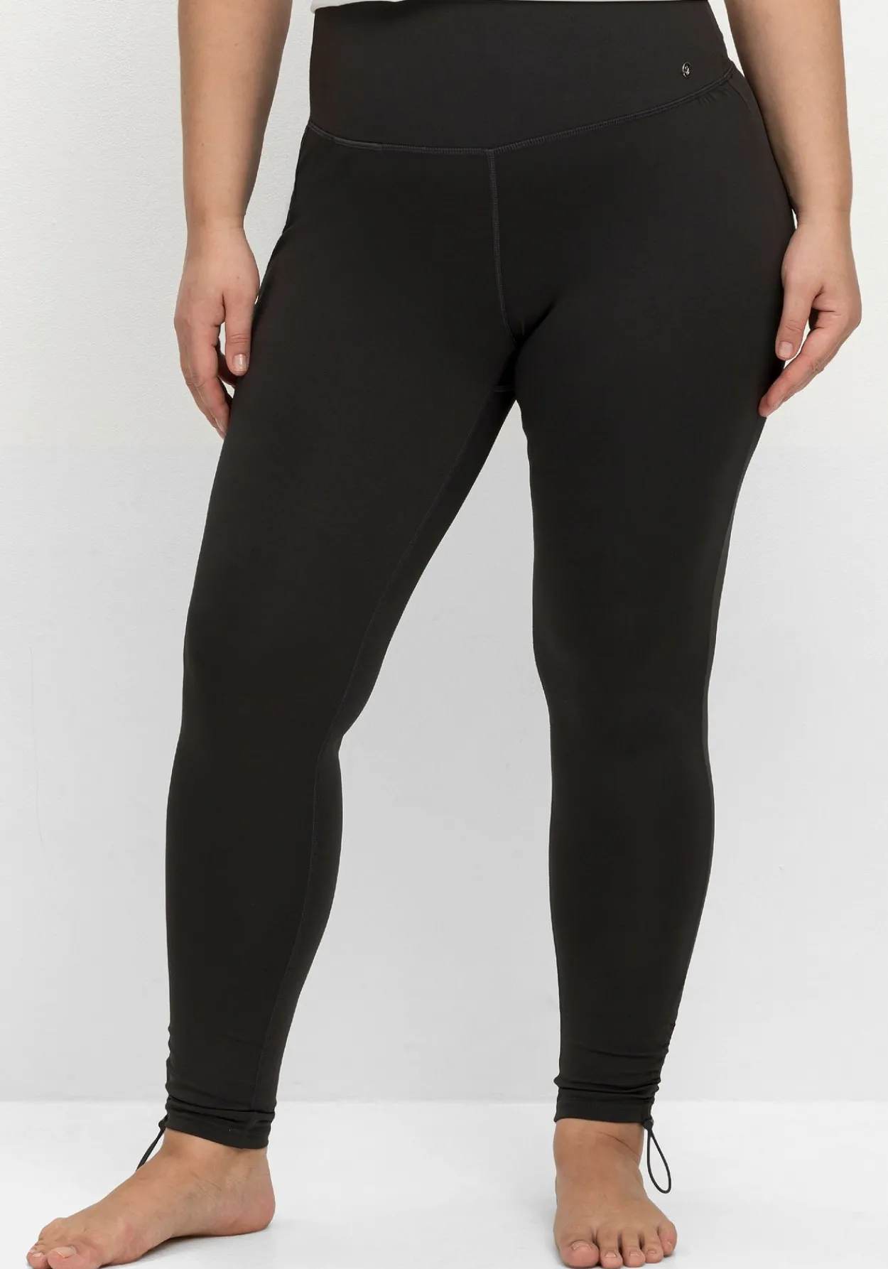 Sportleggings mit Shaping-Effekt, Saum mit Stopper<sheego Best