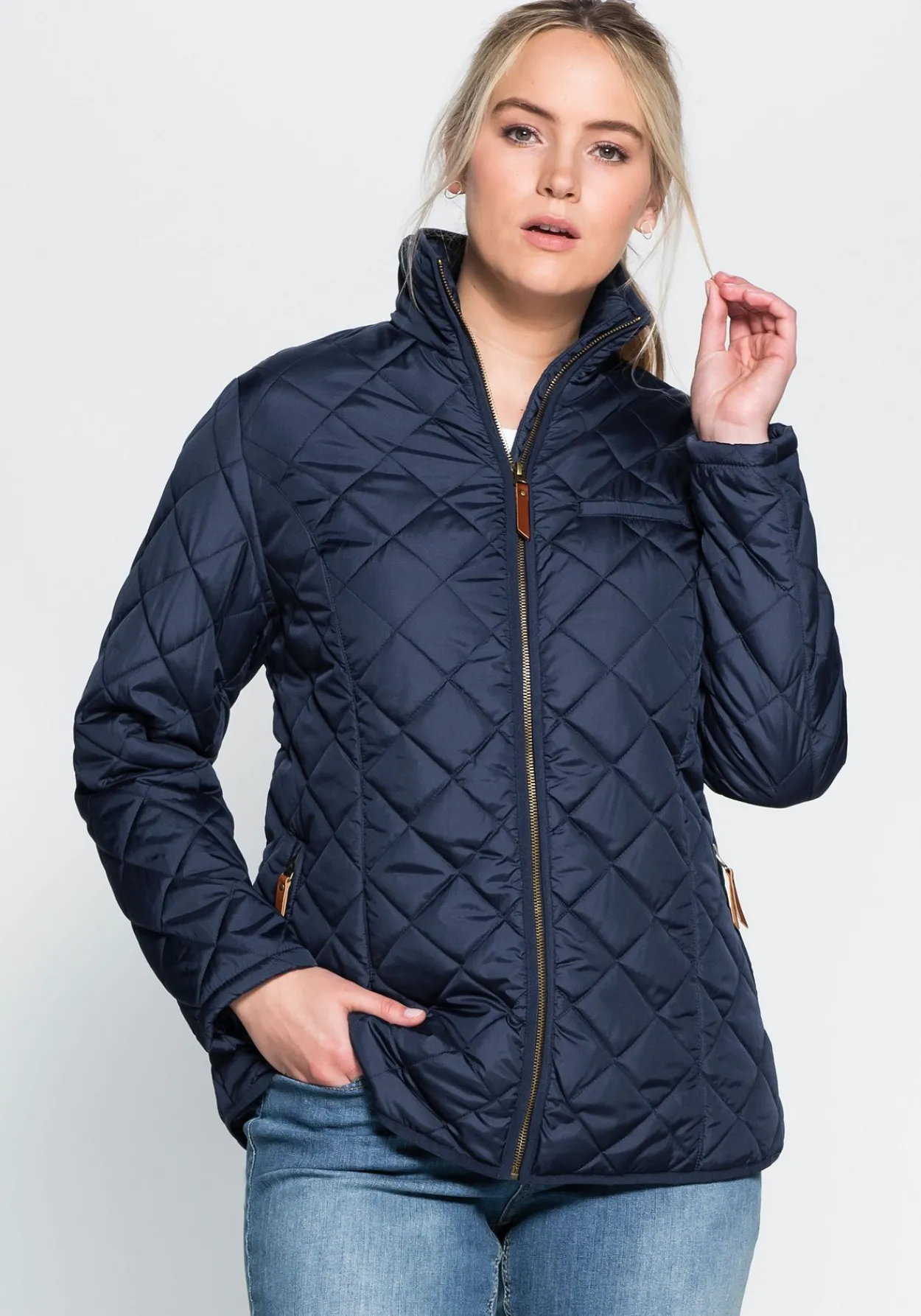 Steppjacke mit hoch schließendem Stehkragen<sheego Online