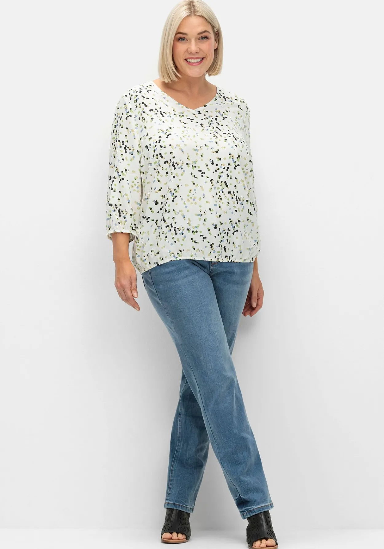 Tunika in Schlupfform, mit Blumenprint<sheego Online