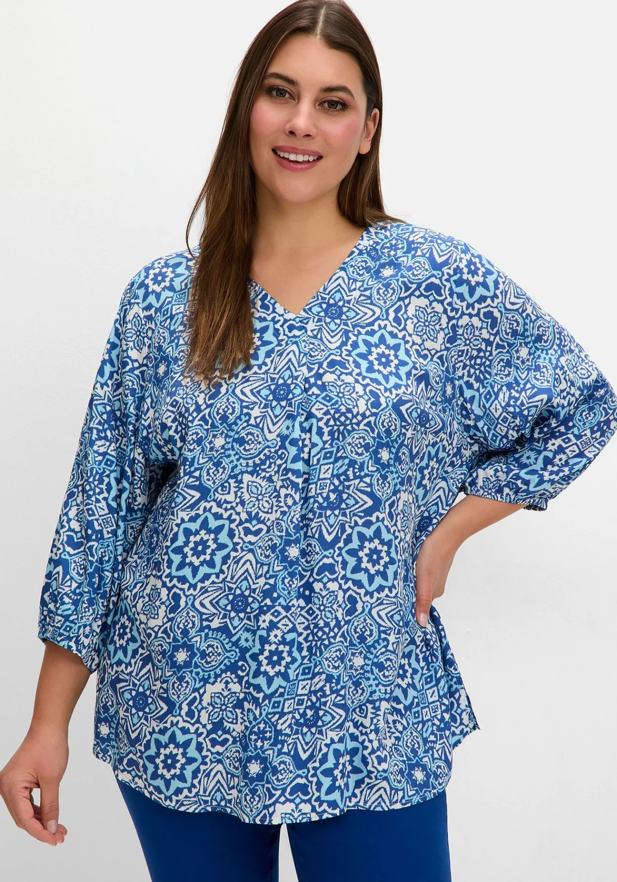 Tunika mit Alloverdruck und 3/4-Arm<sheego Discount
