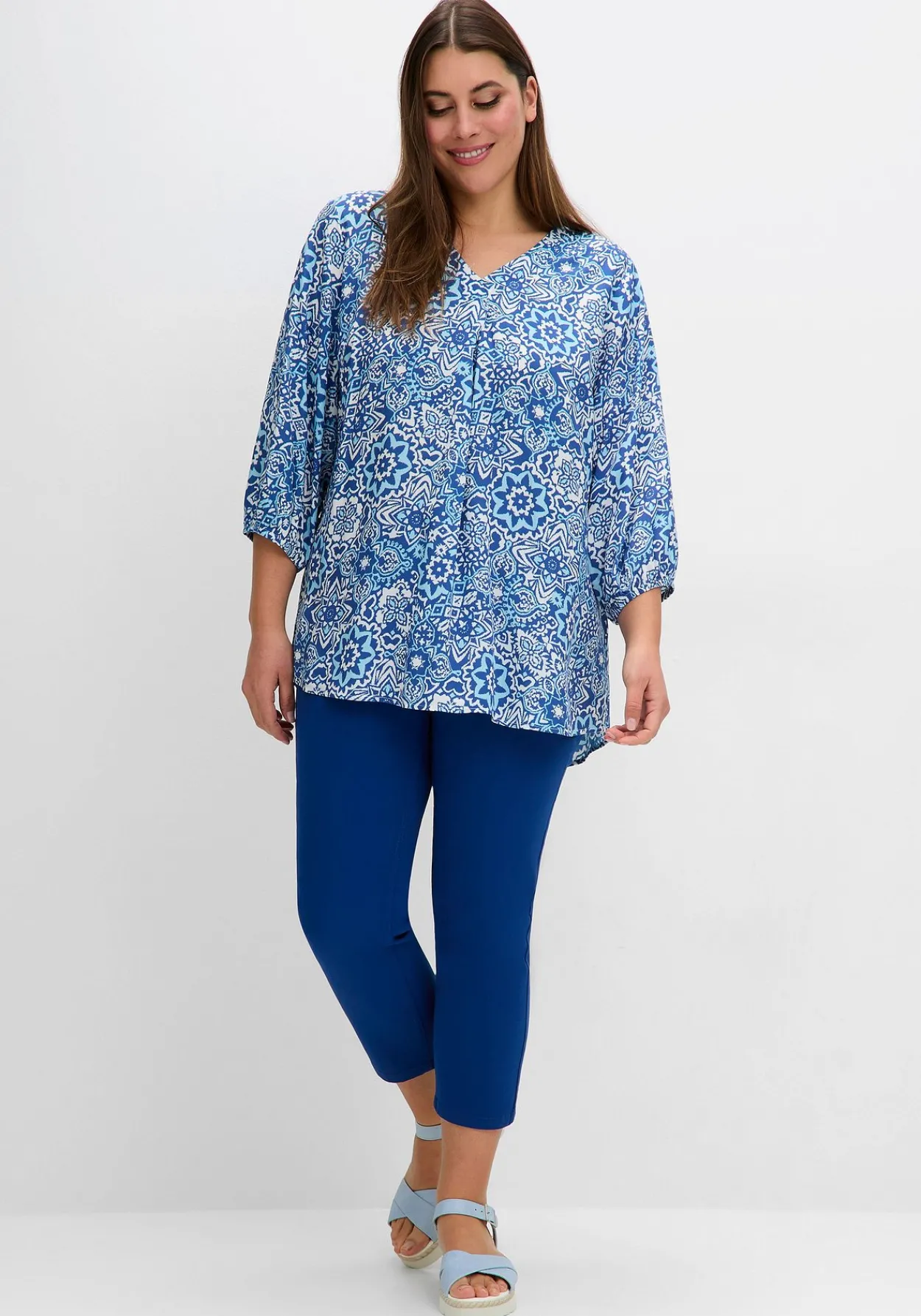Tunika mit Alloverdruck und 3/4-Arm<sheego Discount