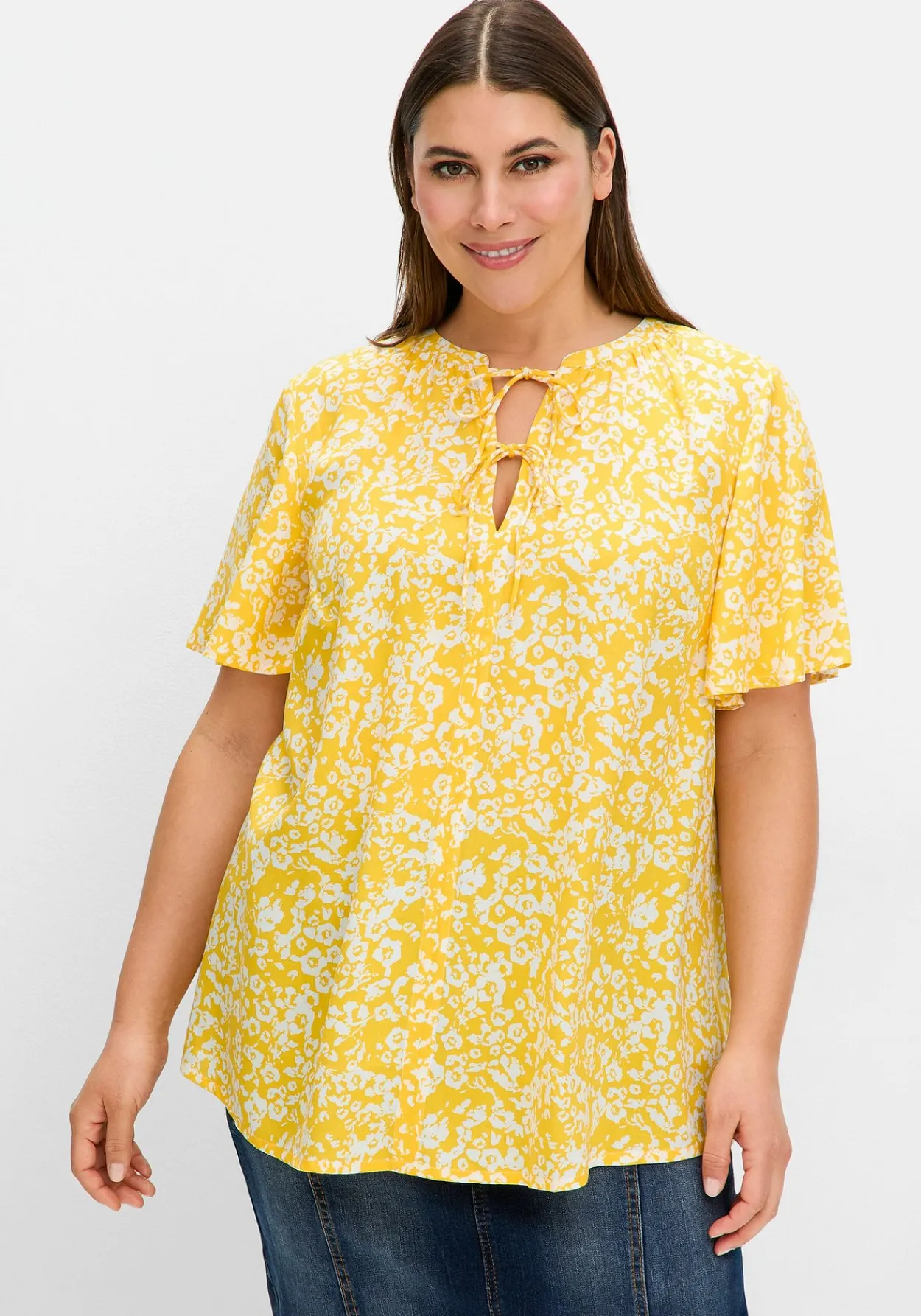 Tunika mit Blütenprint und V-Ausschnitt<sheego Discount