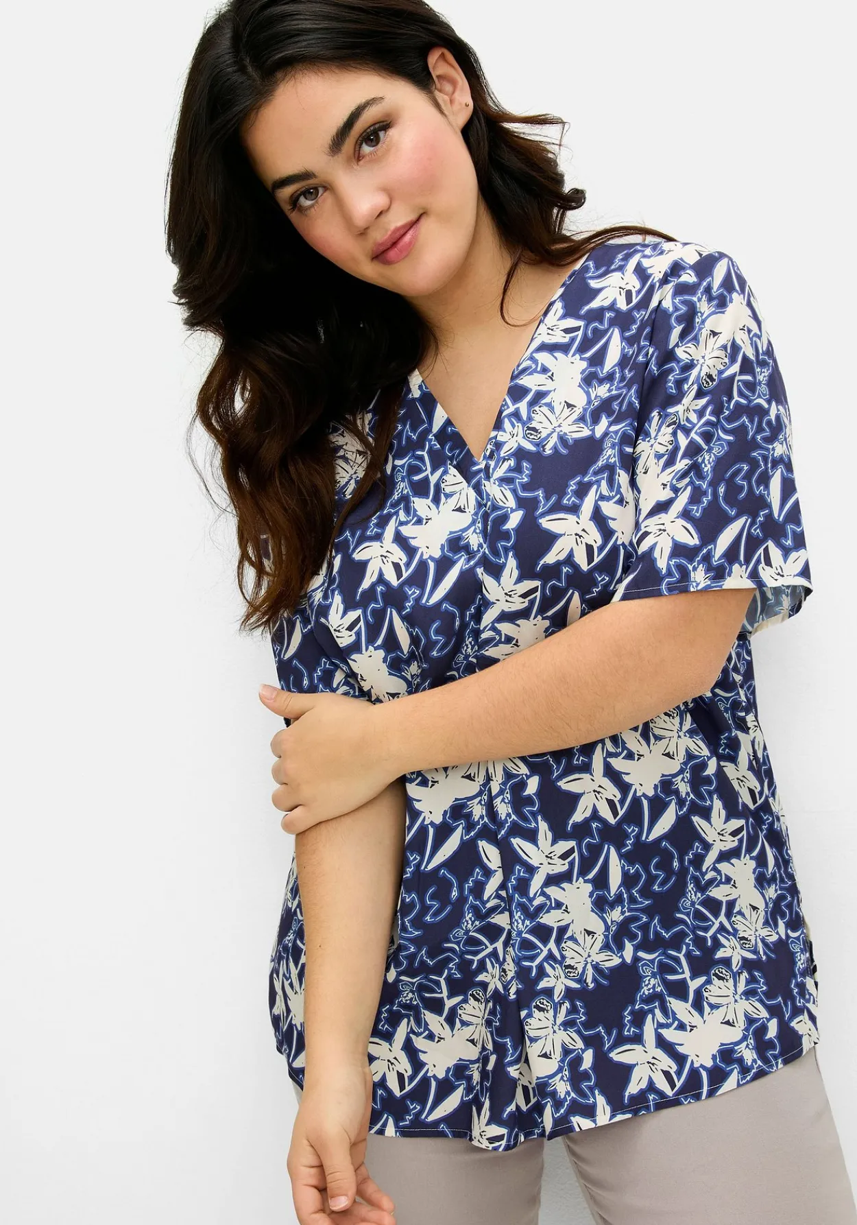 Tunika mit floralem Alloverdruck<sheego Outlet