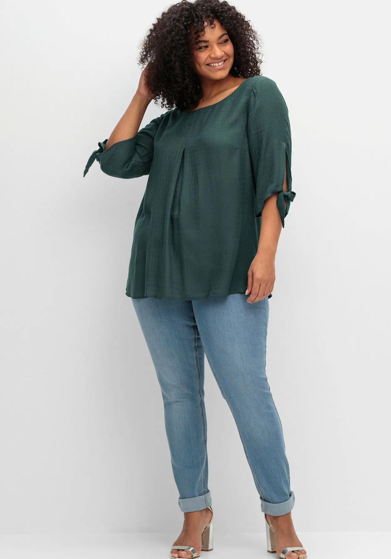 Tunika mit Ärmel-Details und V-Ausschnitt hinten<sheego Fashion
