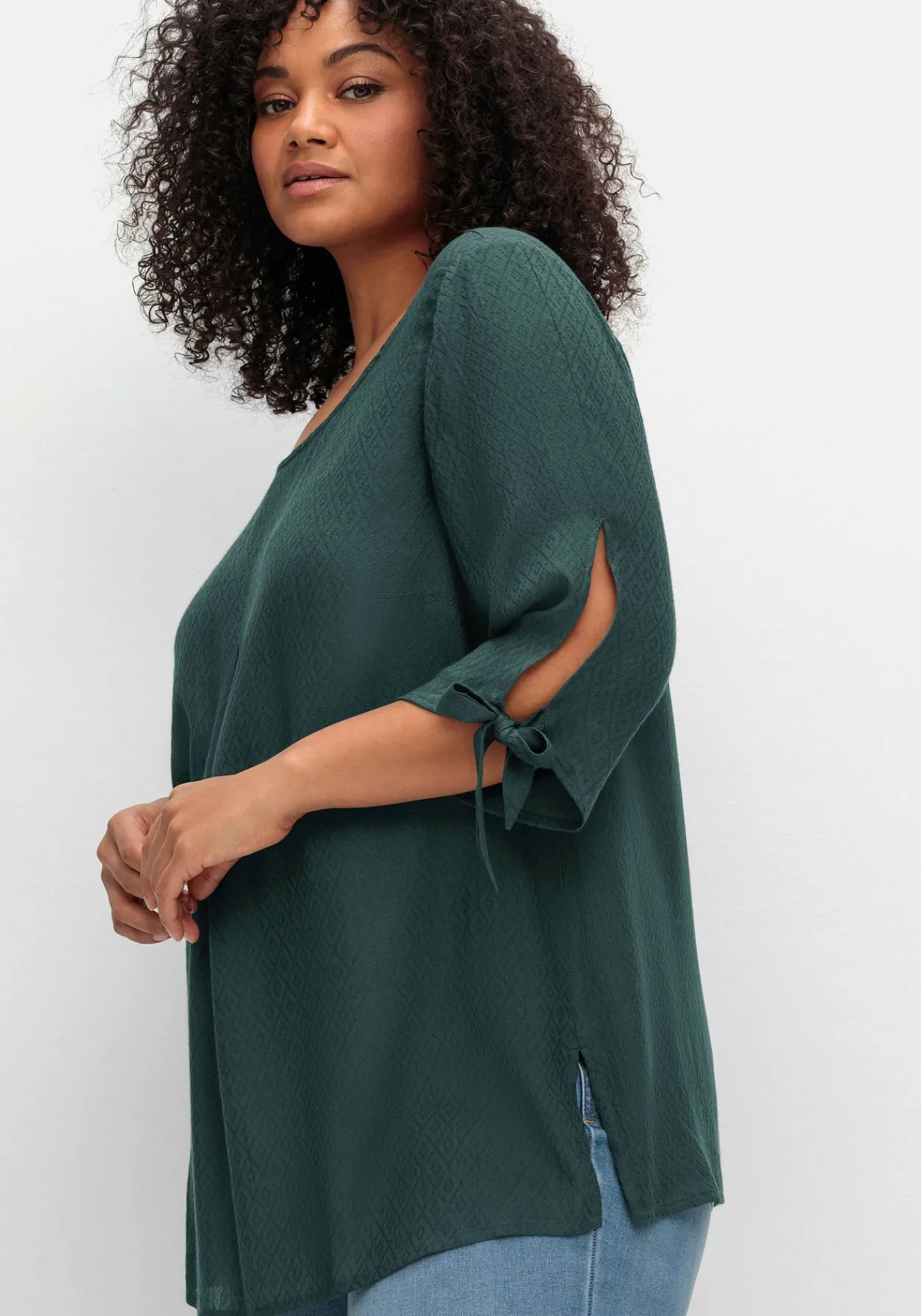 Tunika mit Ärmel-Details und V-Ausschnitt hinten<sheego Fashion