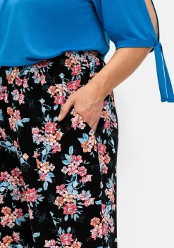 Weite Hose mit Blumendruck und Smok-Abschlüssen<sheego Outlet